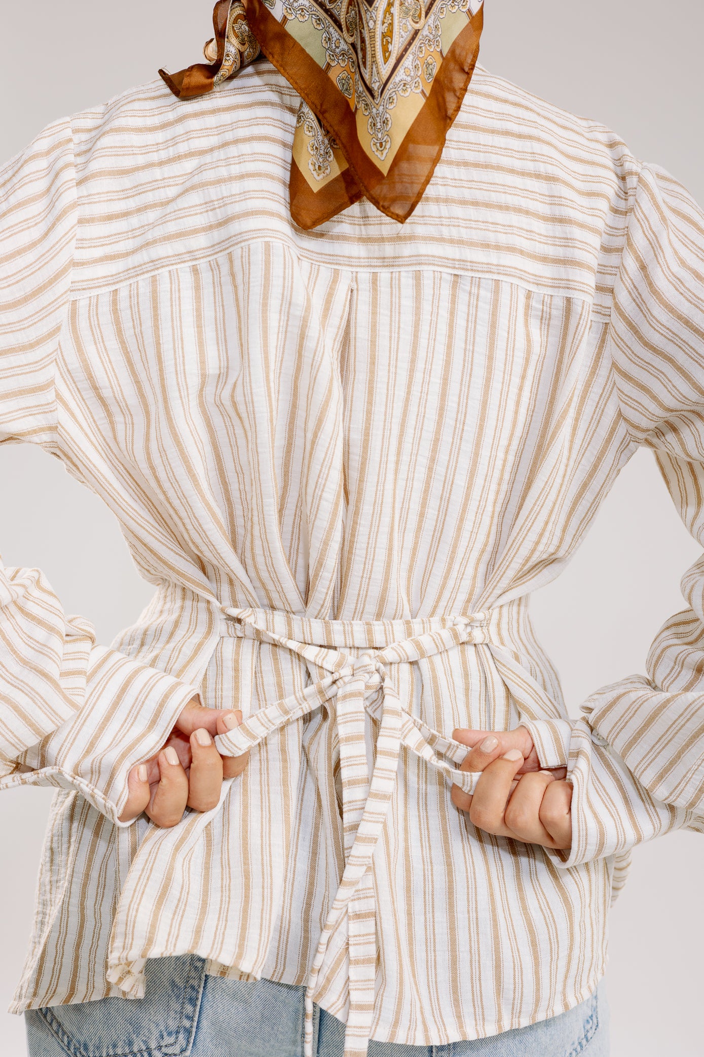 Twisted stripped shirt in brown