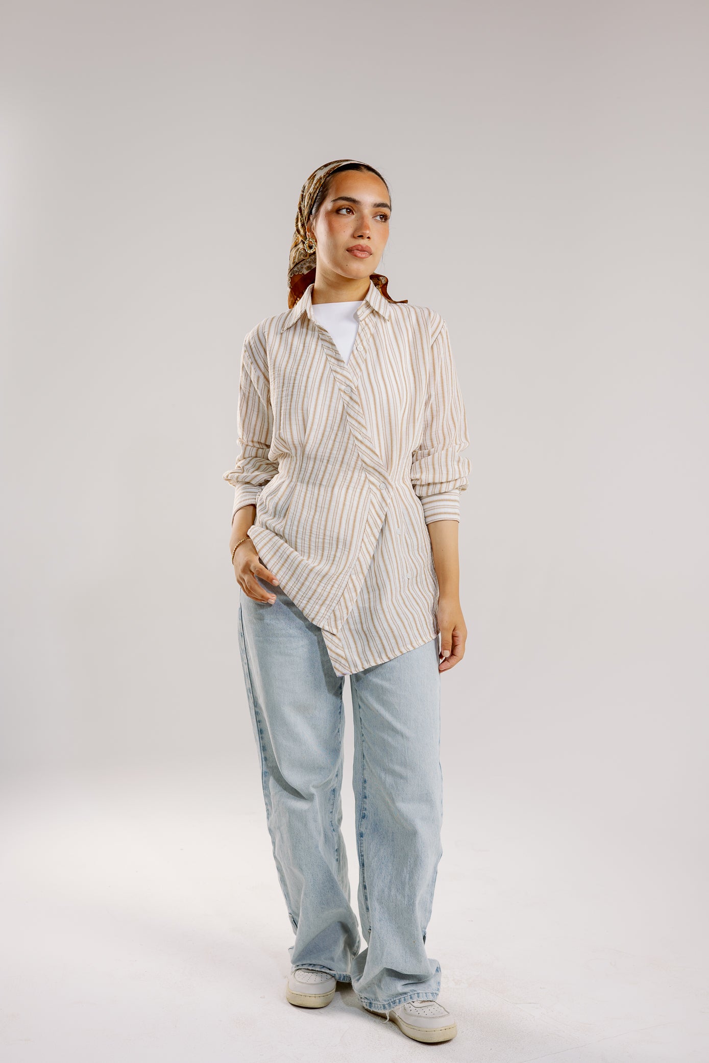 Twisted stripped shirt in brown