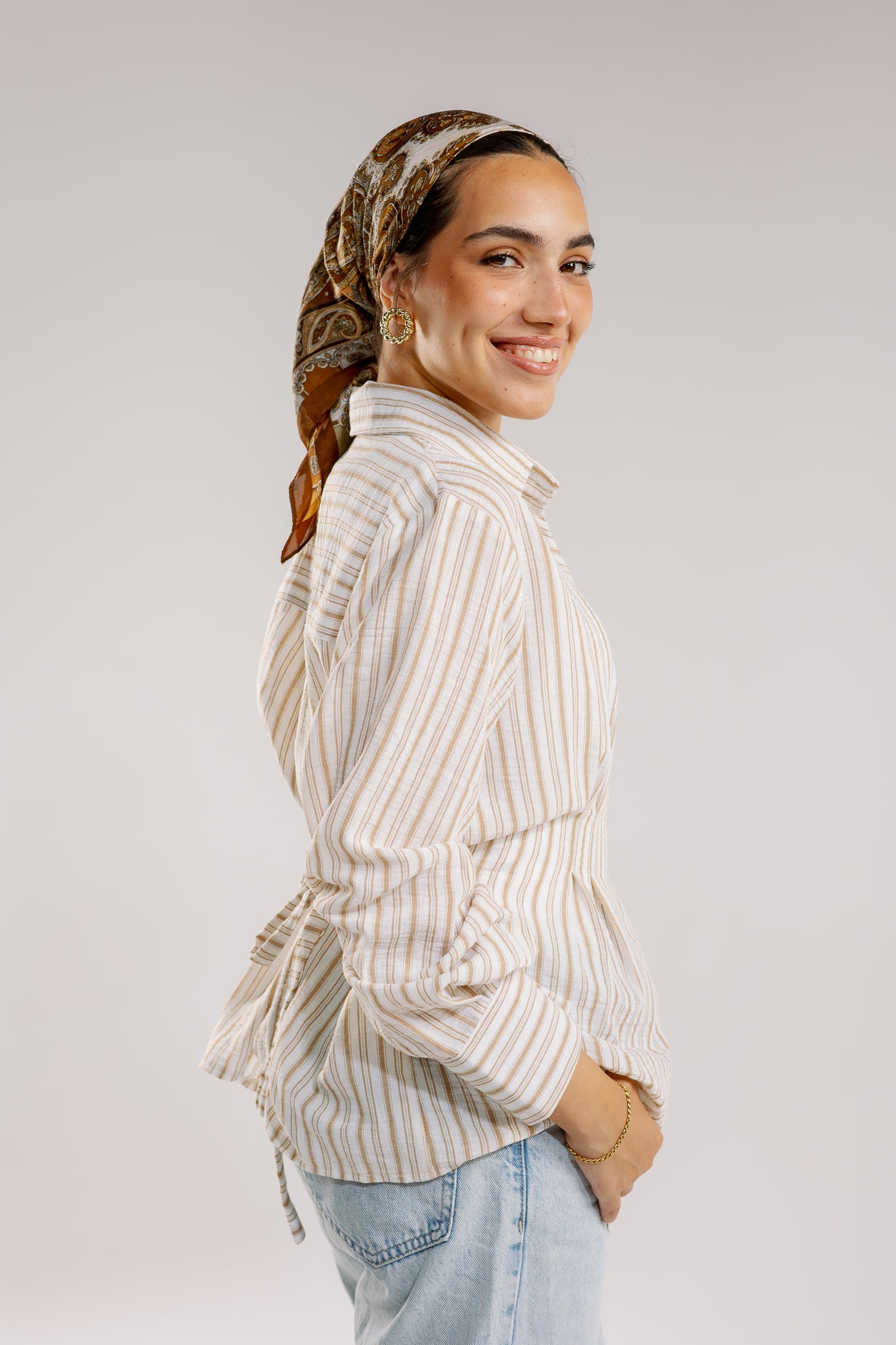 Twisted stripped shirt in brown